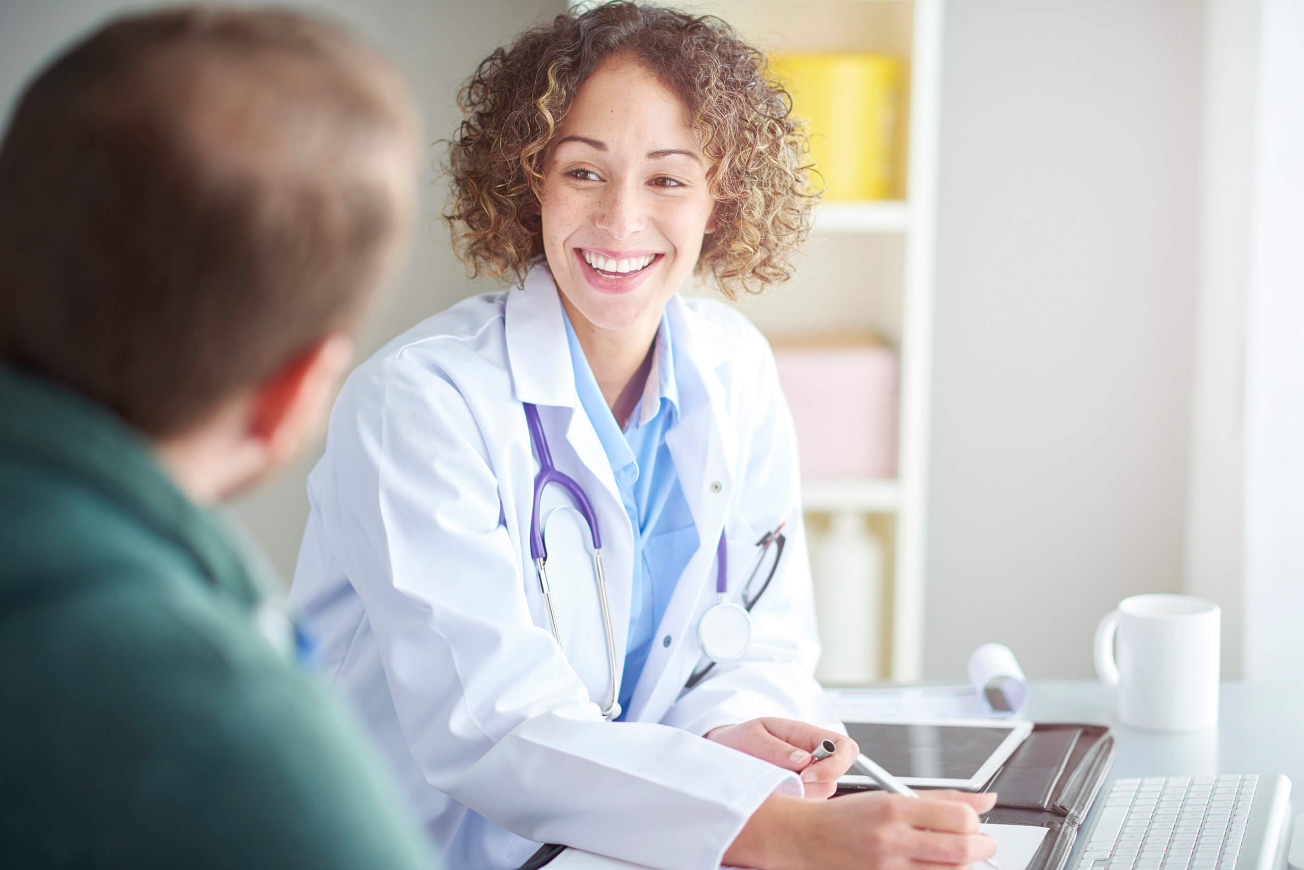 doctor talking to patient