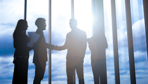 partners shaking hands